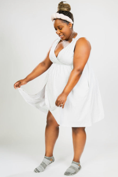 Model wearing a 3-in-1 labor and delivery nursing dress designed for maternity, birthing, and breastfeeding—featuring front snaps, soft stretch fabric, and discreet nursing access.